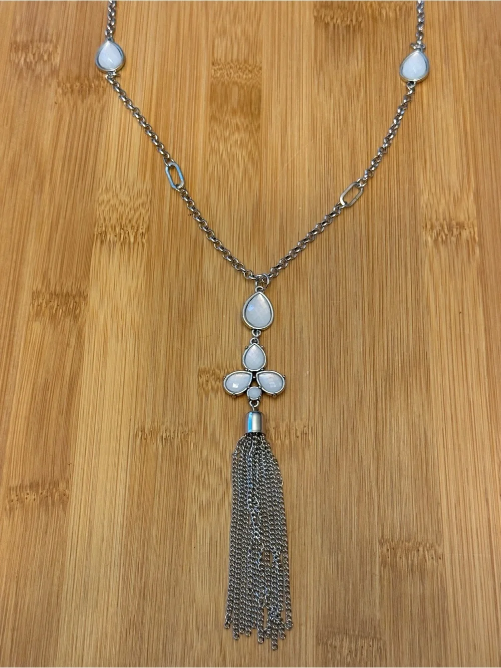 Silver Tone Tassel Pendant Necklace with White Teardrop Accents